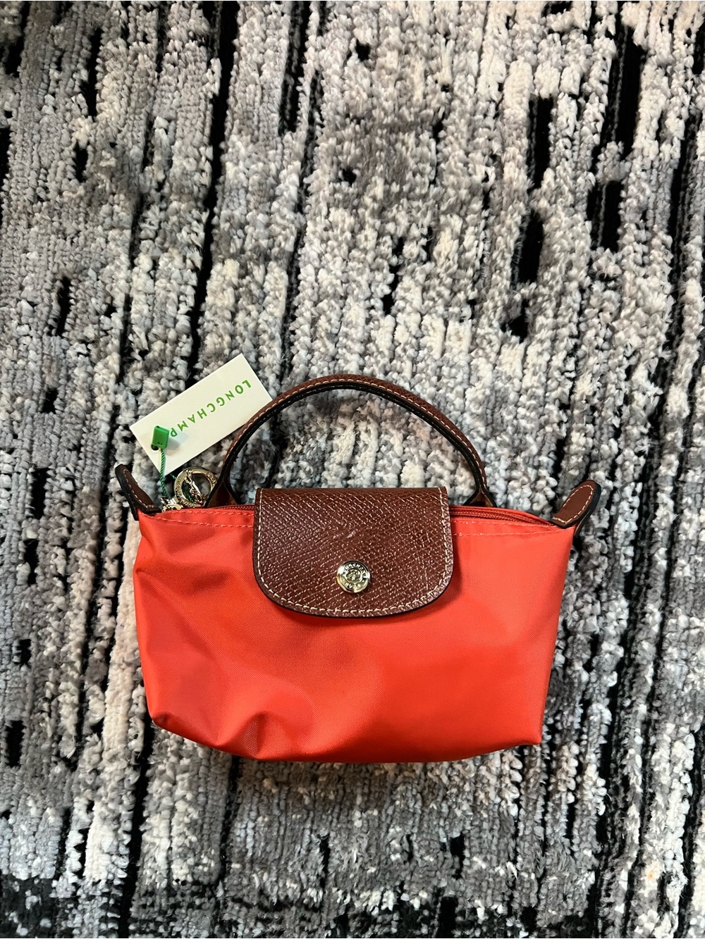 Longchamp small top-handle mini bag in red with brown trim